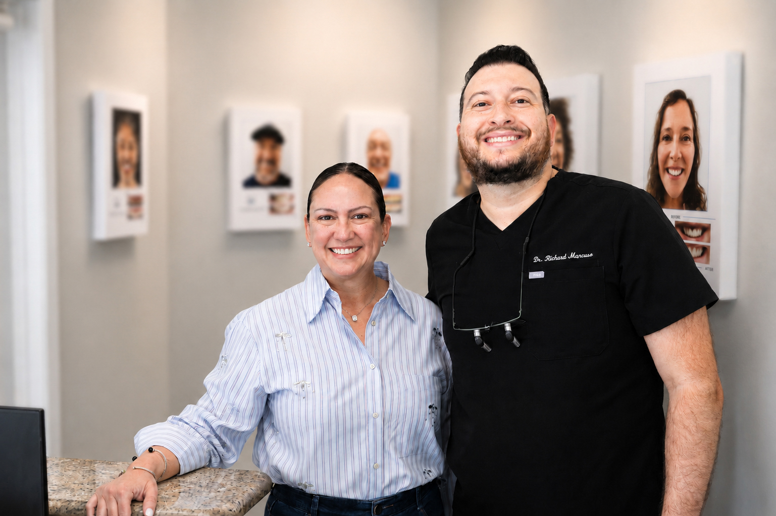 Patient smiling while viewing dental crown results during crowns and bridges treatment in Carrollwood Village, FL