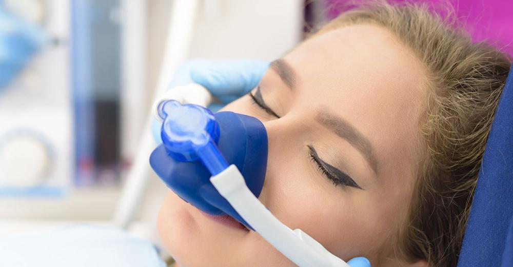 Patient receiving nitrous oxide sedation dentistry in Carrollwood FL