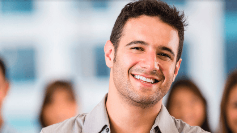 Man smiling after Periodontal disease treatment in Tampa, FL