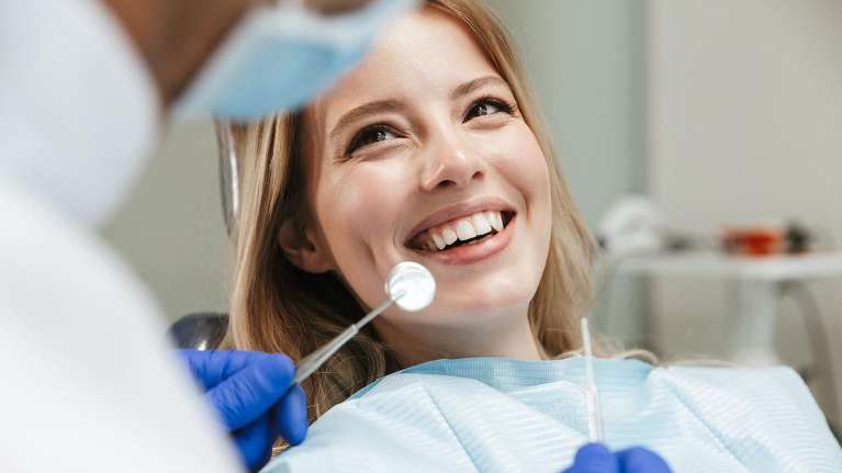 A patient during a visit to a Cosmetic Dentist in Tampa, FL