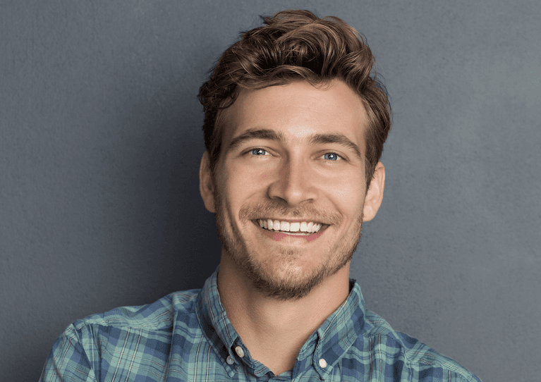 A man with Dental Crowns in Carrollwood, FL