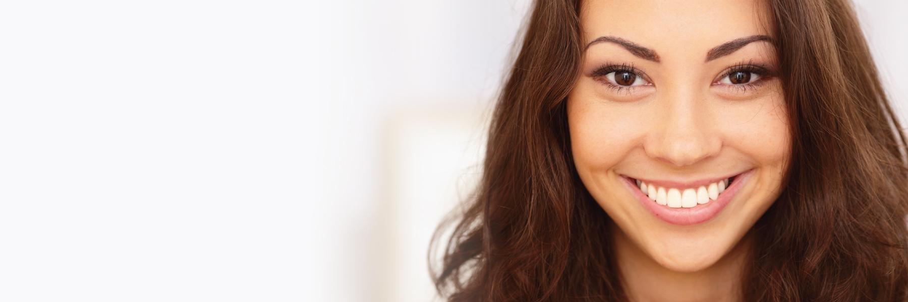 Dental patient smiling after cosmetic dentistry in Tampa
