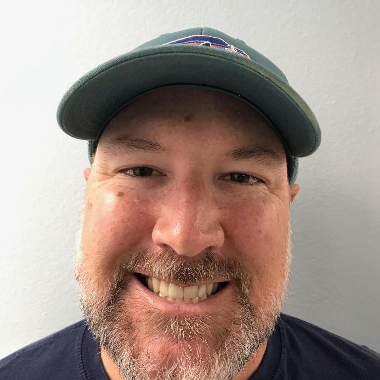 A patient smiling after veneers in Tampa, FL